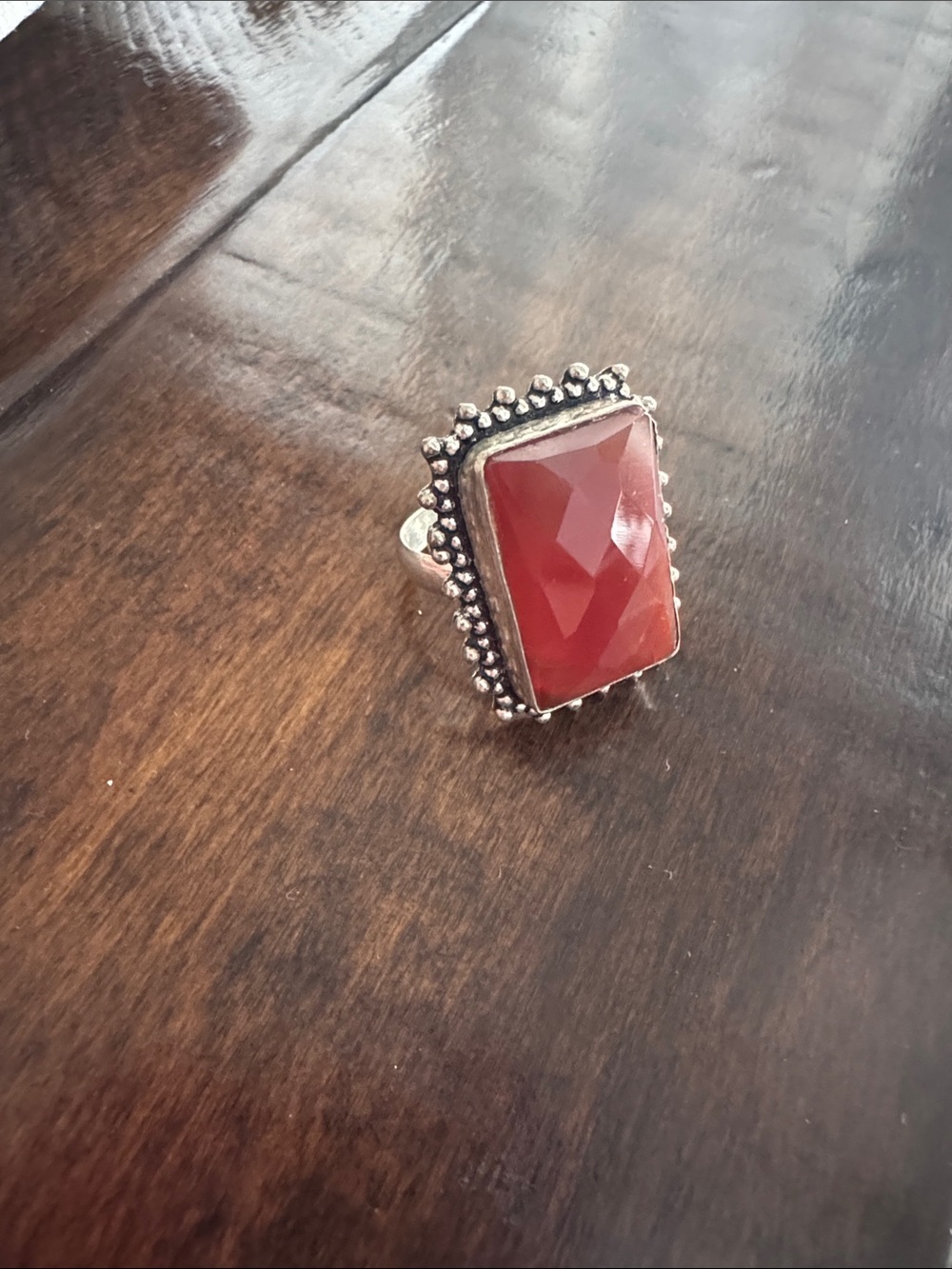 Silver Ring with Faceted Orange Red Stone